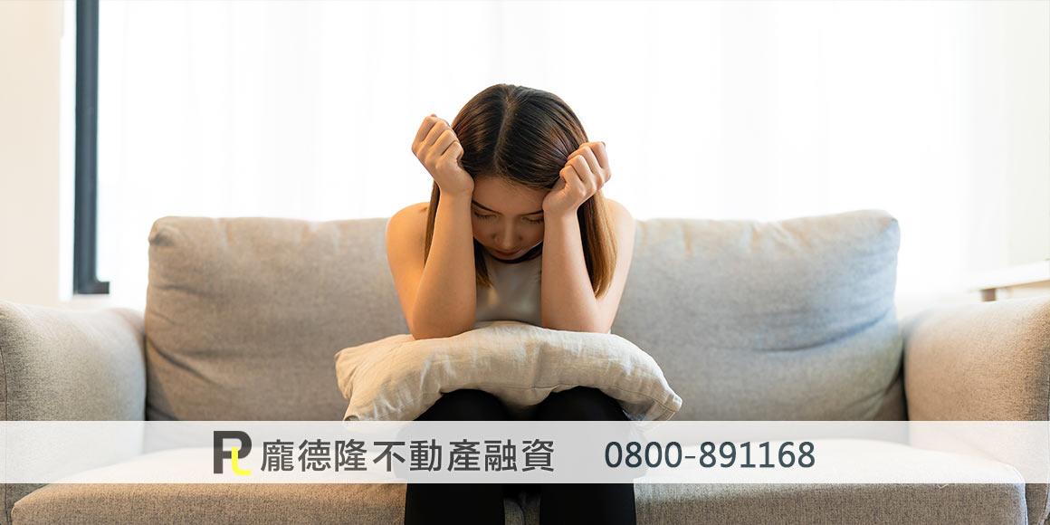 A woman who is upset after being defrauded of money
