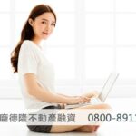 girl holding laptop