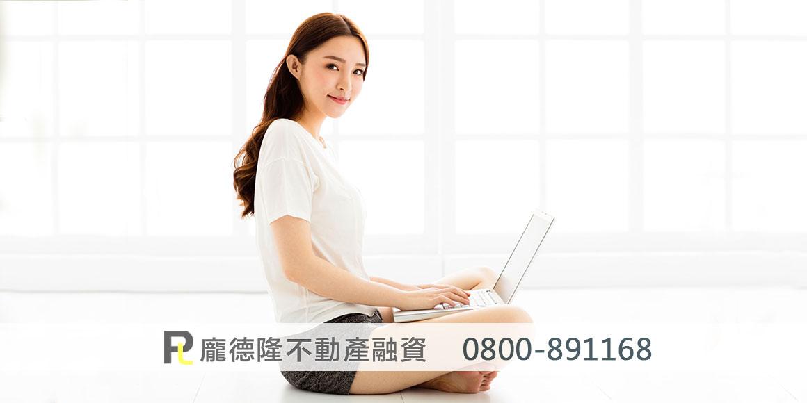 girl holding laptop